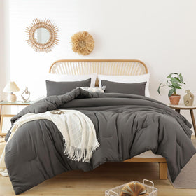 ROSGONIA queen comforter on bed in charcoal grey for a soft, inviting sleep setup.