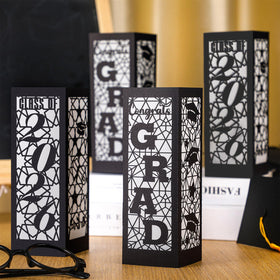 Rossesay Class of 2026 lantern centerpiece in black adds elegant contrast to graduation decor.