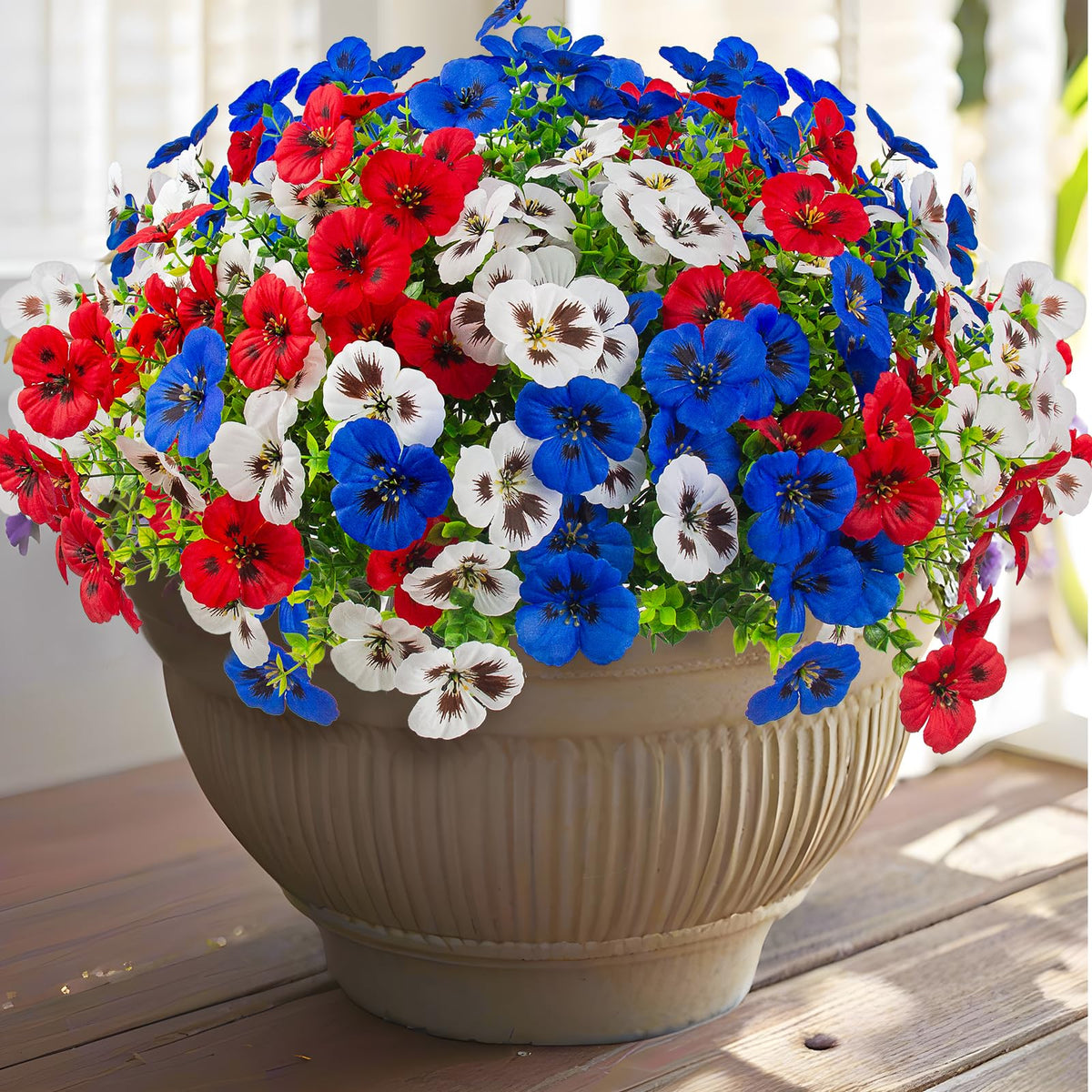 Rowfad pansy outdoor bouquet in red, white, and blue adds vibrant curb appeal.