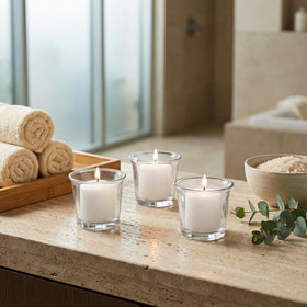 Royal Imports 72-pack white votive candles for bulk centerpiece styling.