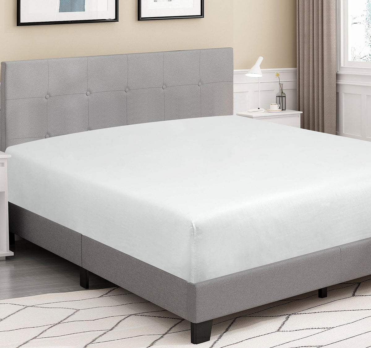 Royale Linens 300TC cotton fitted sheet white folded on bed shows easy styling and ready comfort.