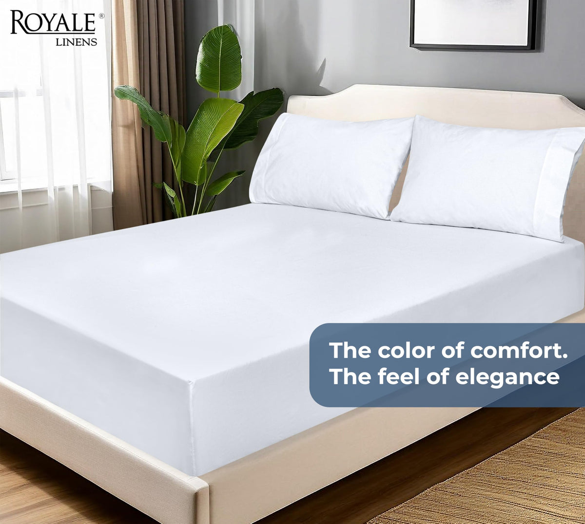 Royale Linens bedroom setup featuring a neatly made white sheet.