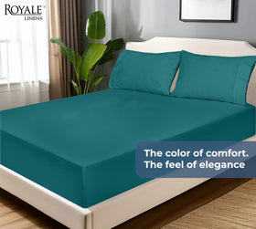 Royale Linens vibrant teal shade adds hotel-inspired bedroom style.