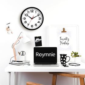 Roymnie battery-operated clock offers easy installation and reliable timekeeping.