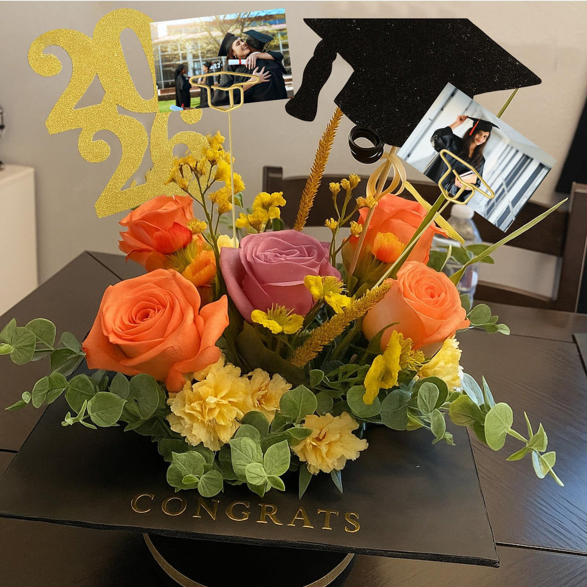 Rtteri gold-cap decor elevates graduation tables with festive, elegant touches