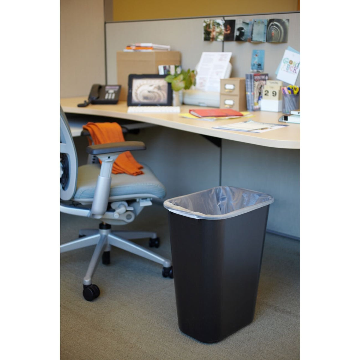 Rubbermaid Deskside 4-pack in black fits under desks and streamlines disposal.