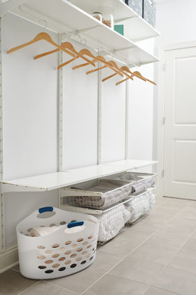 Rubbermaid Flex N Carry laundry basket—durable plastic construction for long-lasting use.