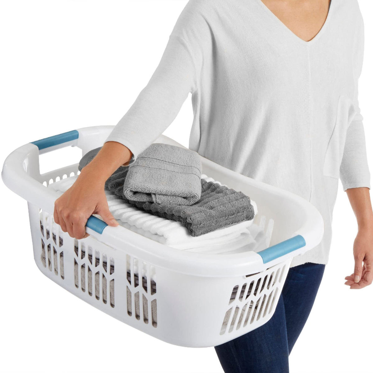 Rubbermaid white laundry basket in use on the hip.