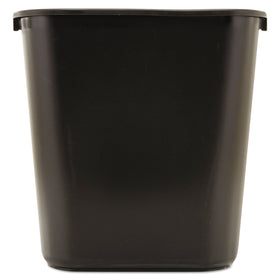 Rubbermaid resin wastebasket under desk in black, ideal for tidy deskside waste management.