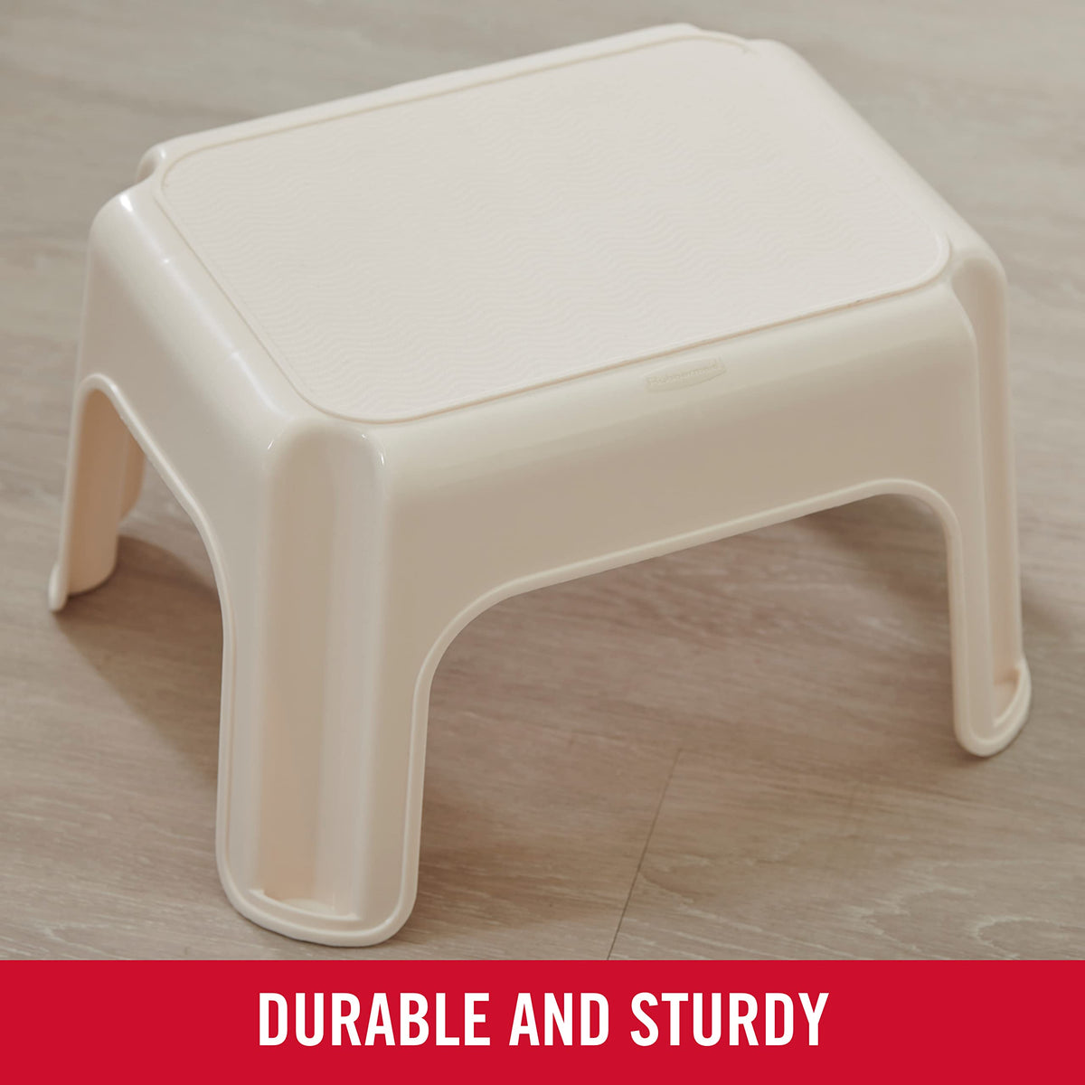 Rubbermaid Roughneck Step-Stool Bisque placed in a bathroom for easy access.