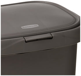 Rubbermaid 13-gallon waste bin, seamless design for simple cleaning and versatile room use.