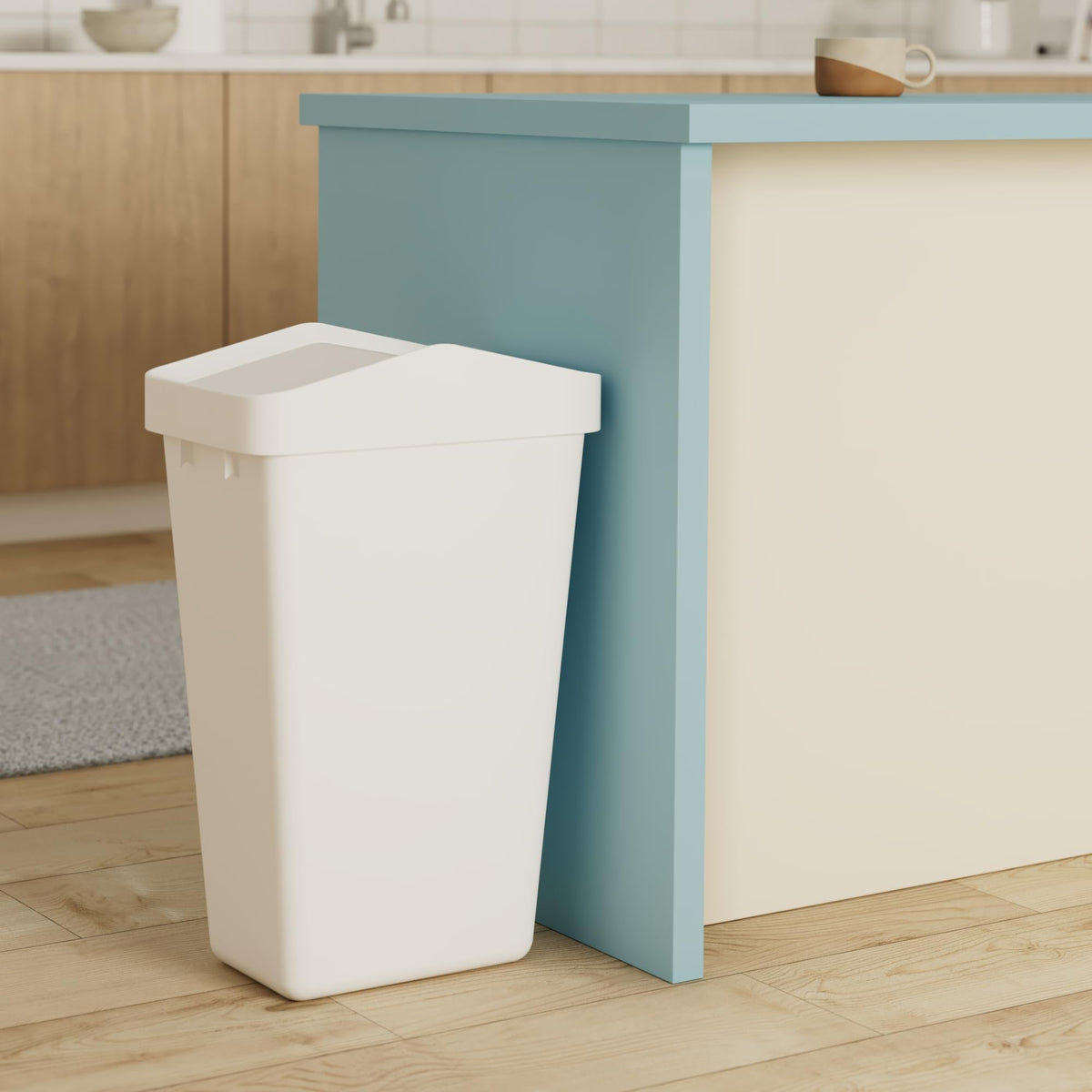 Rubbermaid Swing Top slim design fits tight kitchen corners.