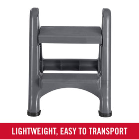 Rubbermaid two-step stool folded upright for compact storage in small spaces.