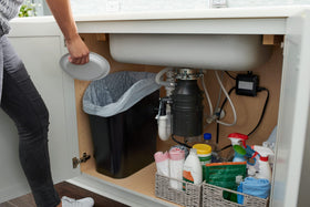 Rubbermaid compact under-counter waste fits under sinks, desks, and cabinets.