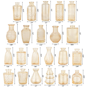 Ruckace small gold glass vases highlight light and wedding decor.