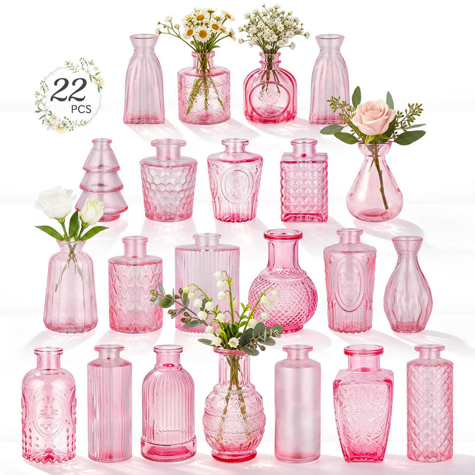 Ruckae pink glass mini bud vase with etched details for elegant centerpieces.