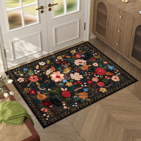 Rugcomf door mat in black with boho floral pattern for entryways, stylish and functional.