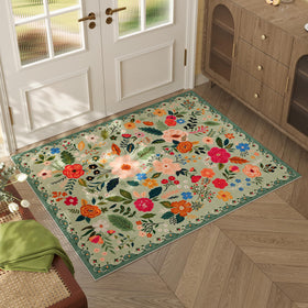 Rugcomf door mat in green boho design that traps dirt at entrances.