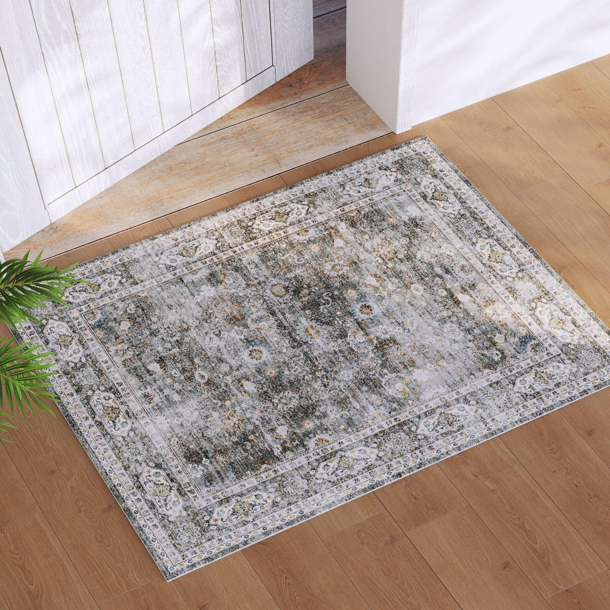 Rugcomf soft low-pile rug in grey offers plush underfoot comfort.