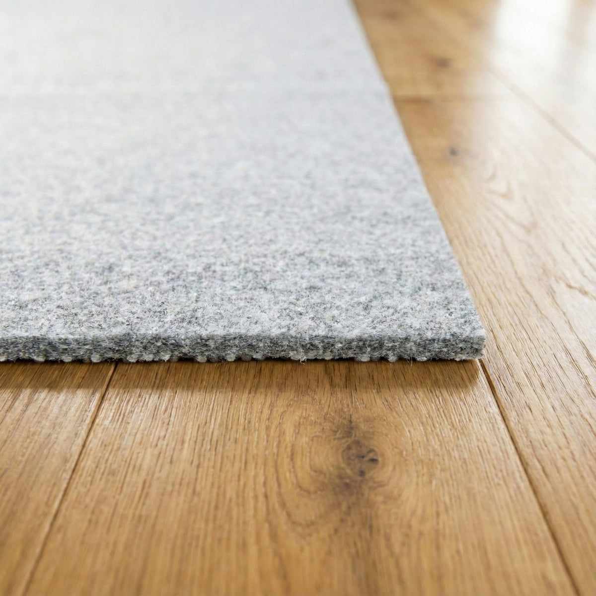 Rugs.com Everyday Performance Rug Pad anti-slip backing close-up demonstrates grip.