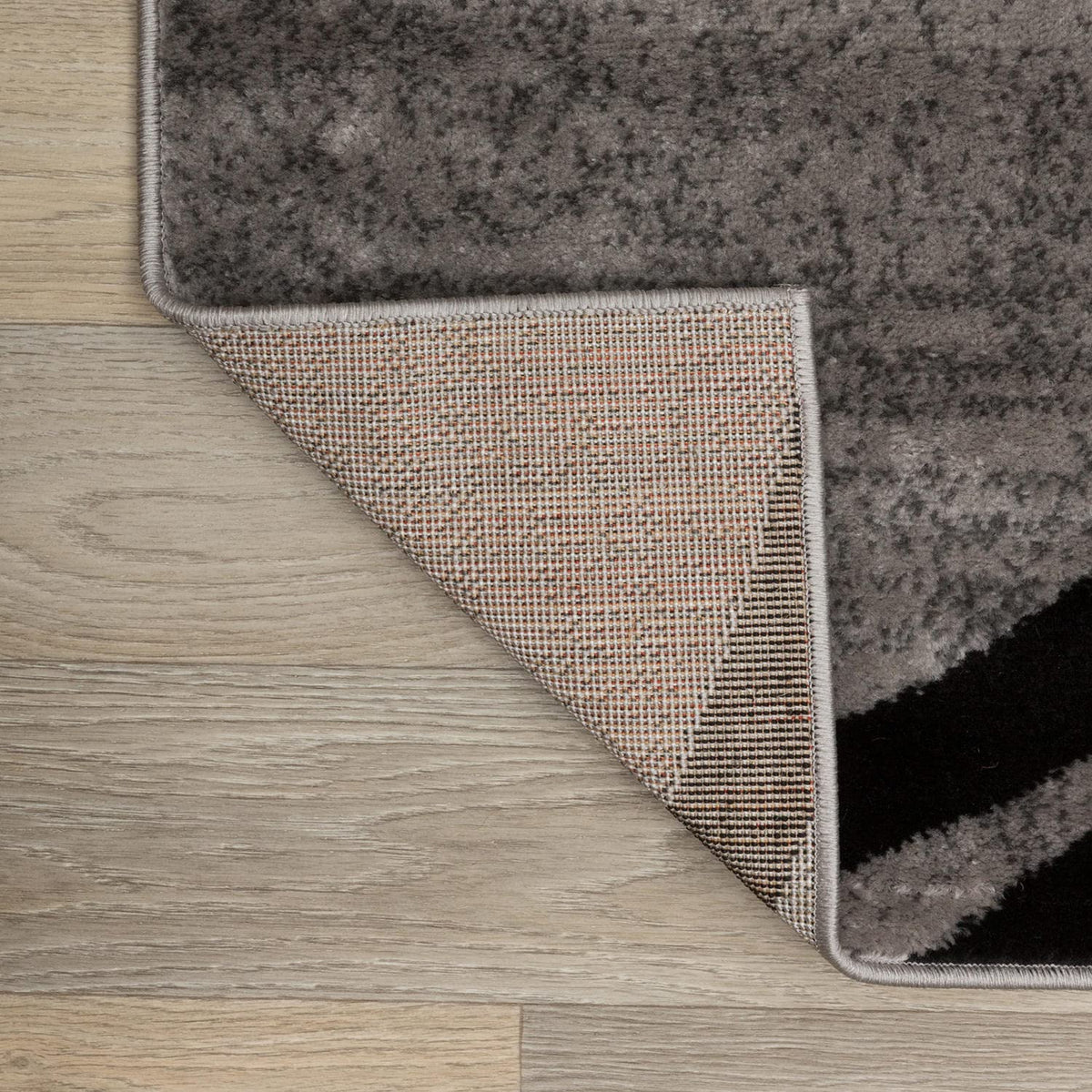 Rugshop wavy circles area rug gray is fade-resistant for timeless appeal.