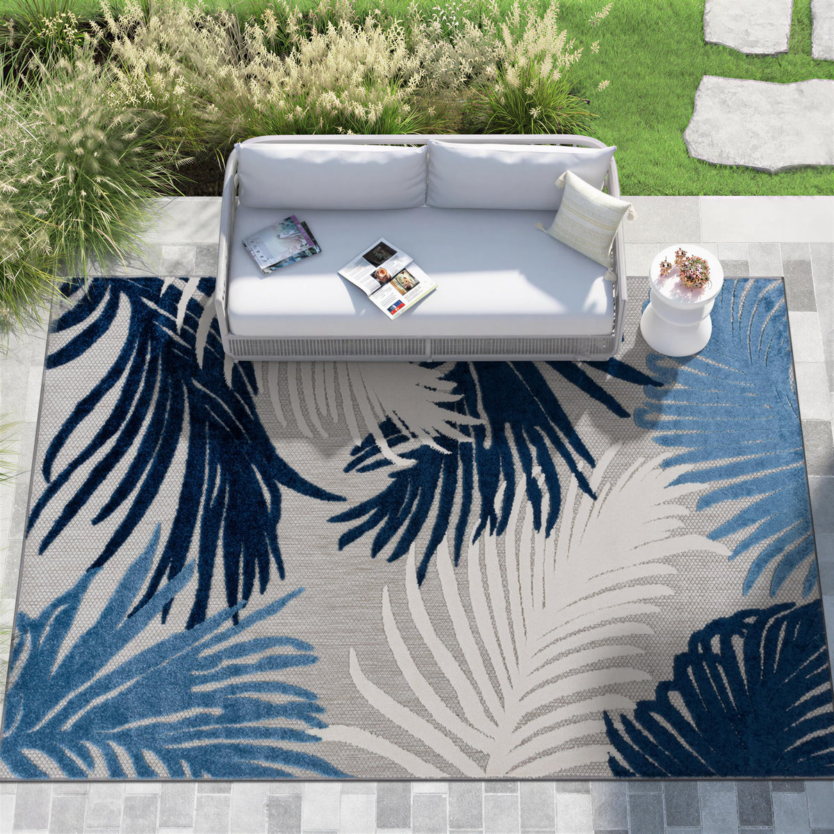 Rugshop Lucca outdoor patio setup showcases bold florals and easy upkeep.