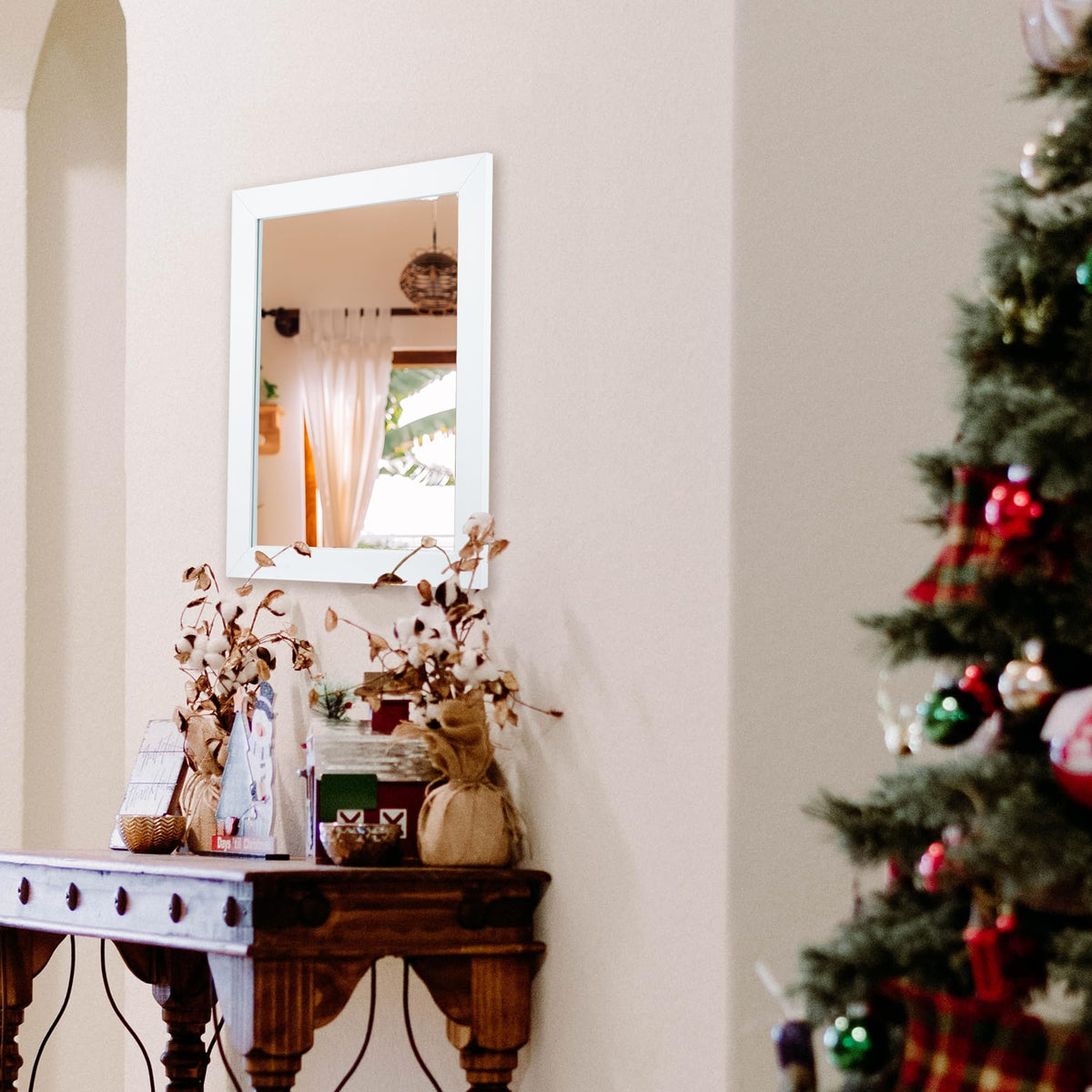 Ruomeng mirror showcased in living room setup for brighter, open space feel.