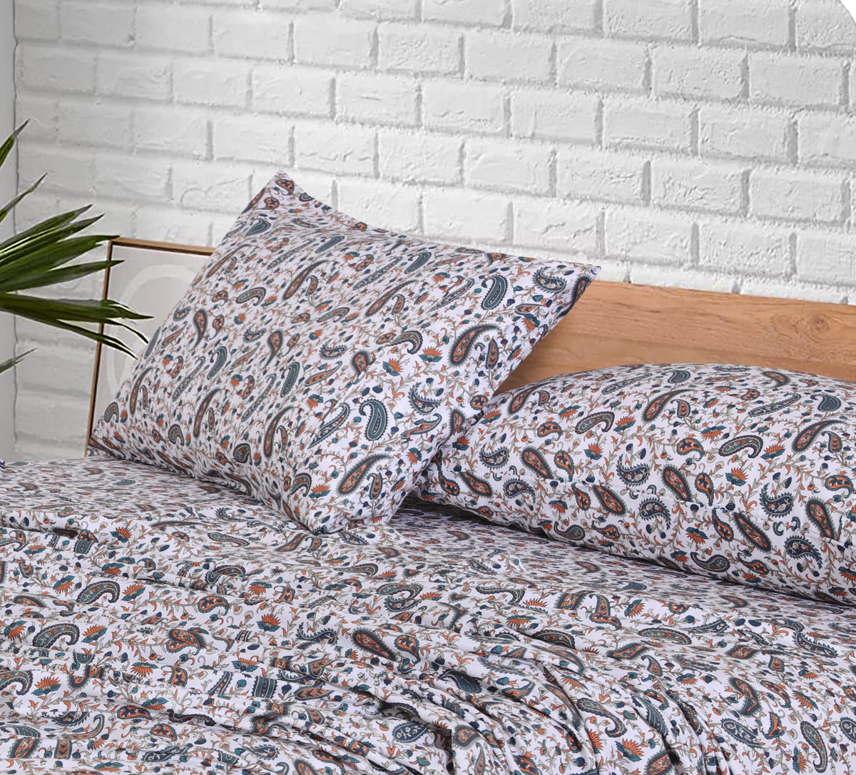 RUVANTI teal paisley bedroom setup with crisp bedding.