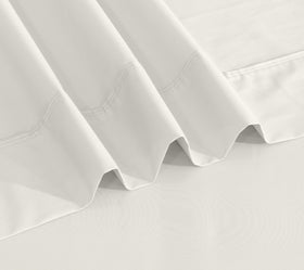 RUVANTI deep-pocket demo illustrating secure 16-inch mattress fit