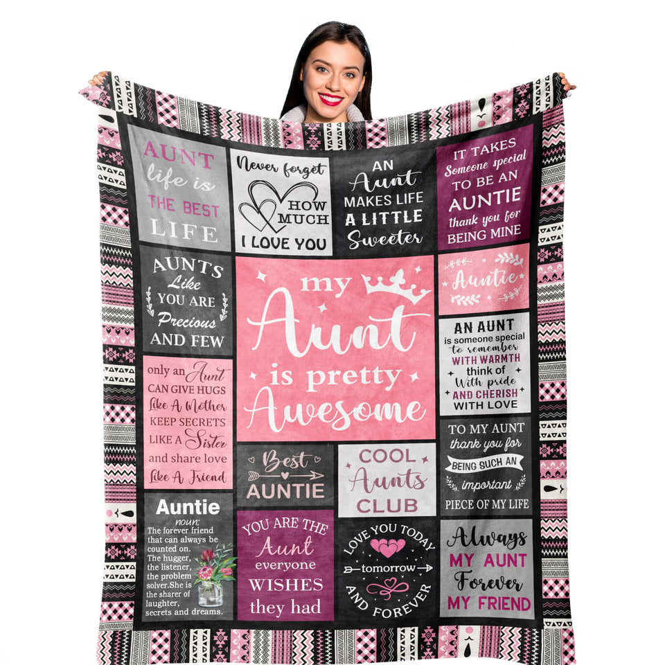 Ruvinzo Aunt Blanket 60x50 on bed for movie nights and lounging.