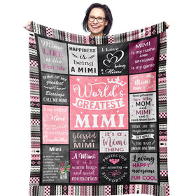 Ruvinzo Mimi blanket on a sofa, soft fleece for year-round warmth and comfort.