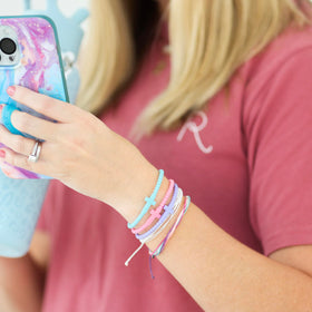 Ryan & Rose Jesus Bracelet Cross silicone Kaleidoscope 25-pack packaging display and gifting option.