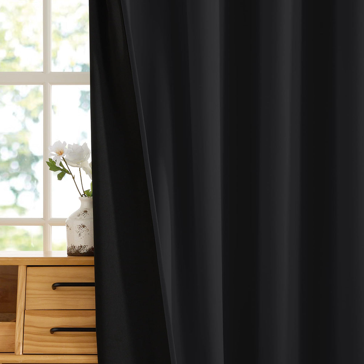 RYB HOME darkened bedroom scene illustrates a private, distraction-free space.