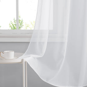 RYB HOME living room setup with soft light filtering through curtains