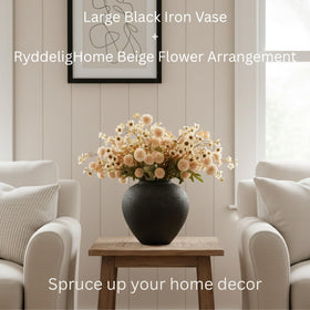 RyddeligHome Arina black round vase used as a dining centerpiece