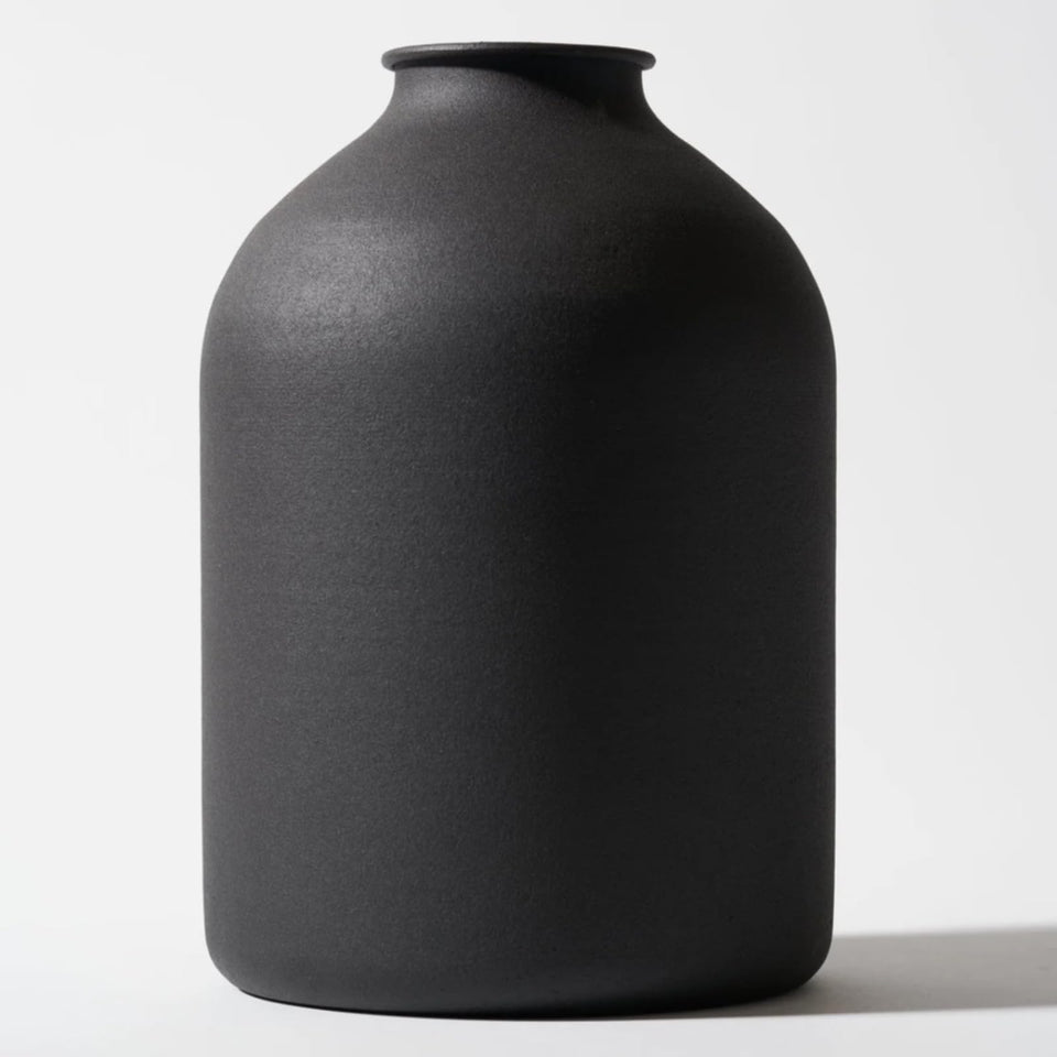 RyddeligHome Arlo tall matte-black vase centerpiece for modern living rooms.