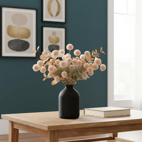RyddeligHome eucalyptus stems add airy height to modern centerpieces and shelves.