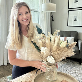 RyddeligHome eucalyptus, billy buttons, and gypsophila arrangement in vase