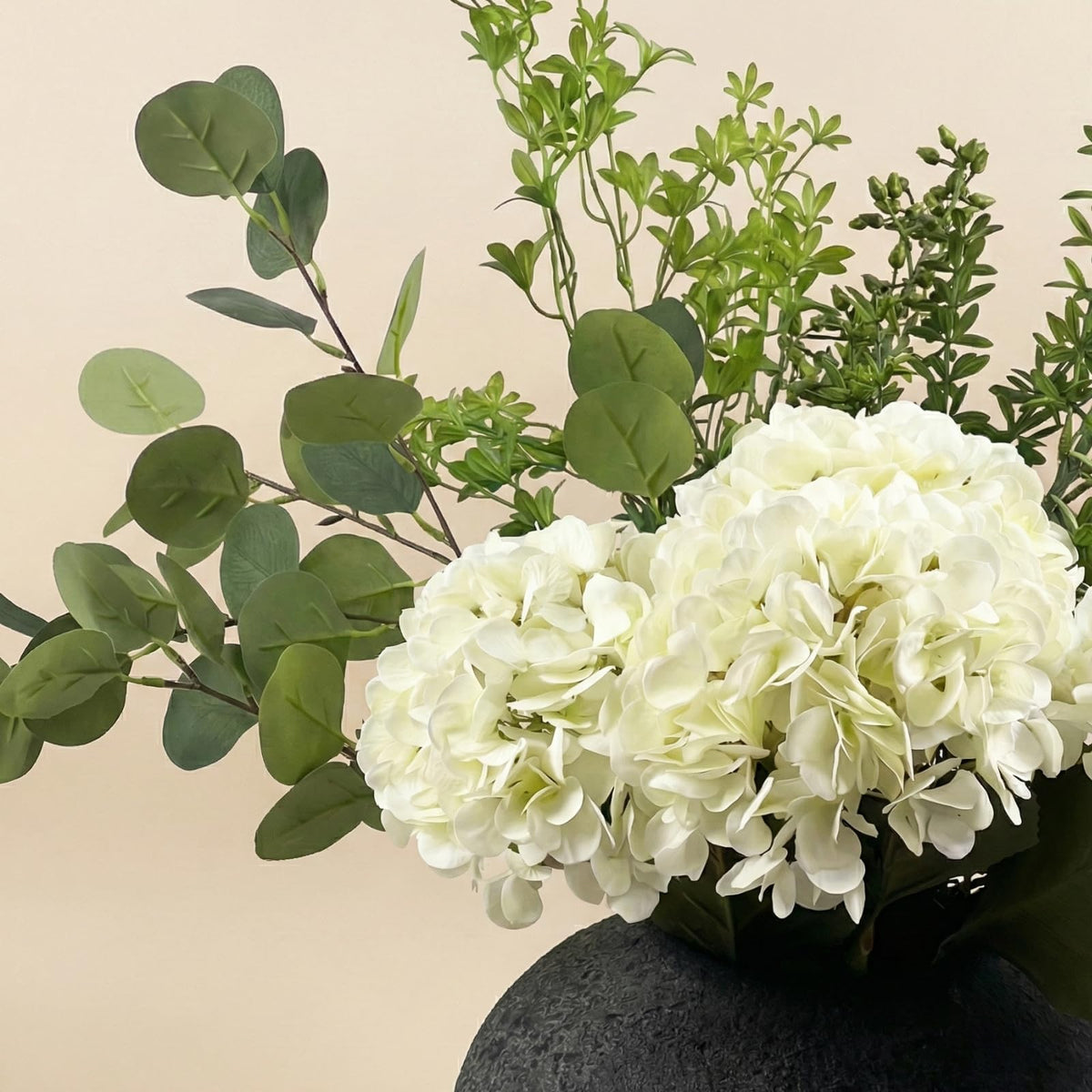 RyddeligHome faux arrangement elevating entryways and living spaces