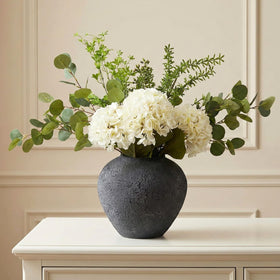 RyddeligHome faux arrangement with eucalyptus and white hydrangea as a tall 30in centerpiece