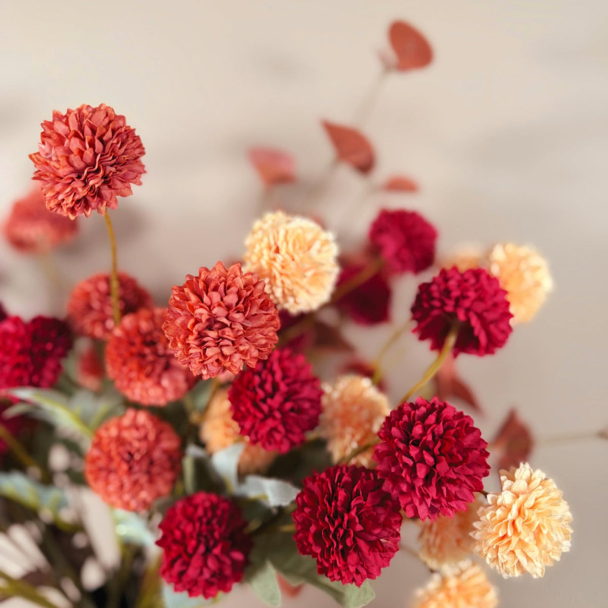 RyddeligHome orange-burgundy kiku bouquet for rustic centerpiece