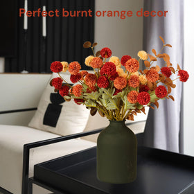 RyddeligHome terracotta mini balls add earthy texture to vases