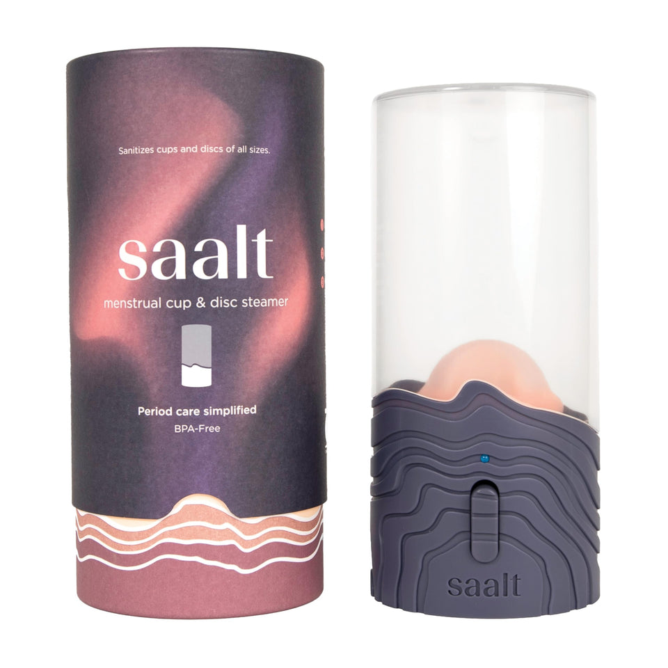 Saalt menstrual cup steamer in blue dusk showing compact design for on-the-go care.