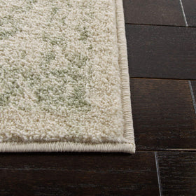 SAFAVIEH Adirondack living room ambience adds warmth with ivory and sage tones.