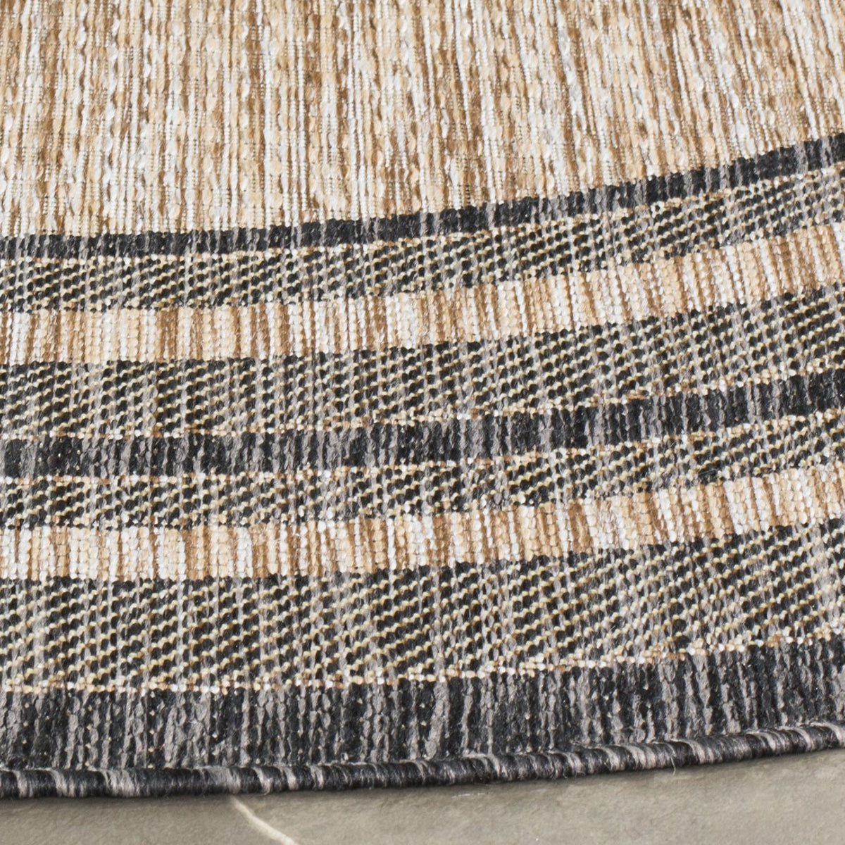 Safavieh Courtyard outdoor rug perfect for decks with stain- and weather-resistance.