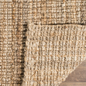 SAFAVIEH Natural Fiber Runner Rug entryway setup showing durable jute surface