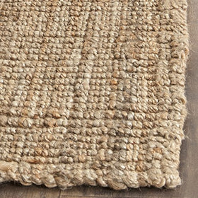 SAFAVIEH NF447A natural brown tone complements rustic and coastal interiors.