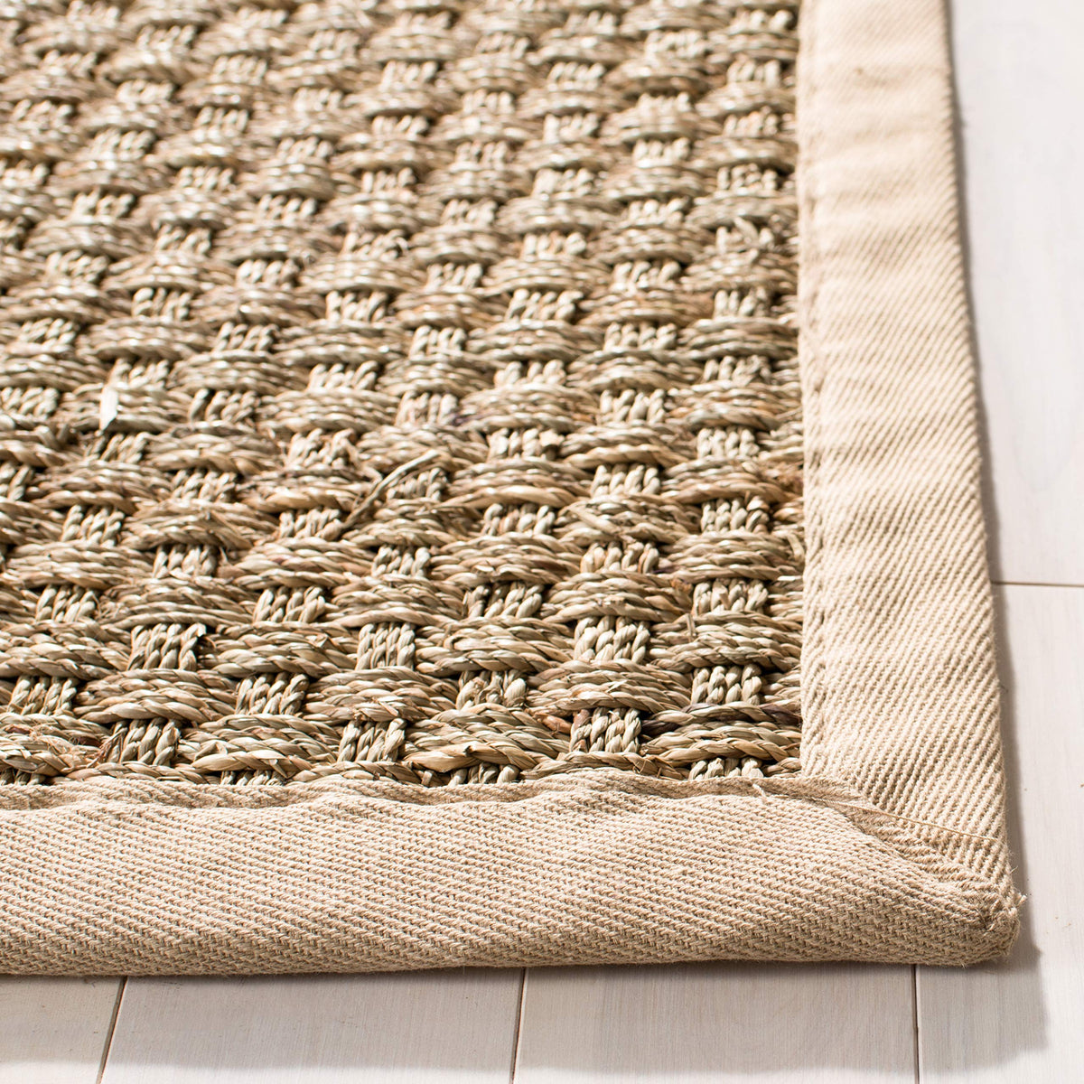 Safavieh NF114A basketweave pattern close-up highlights natural charm and texture.