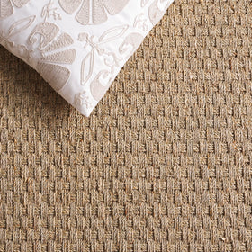 Safavieh NF114A ideal for coastal or farmhouse living spaces.