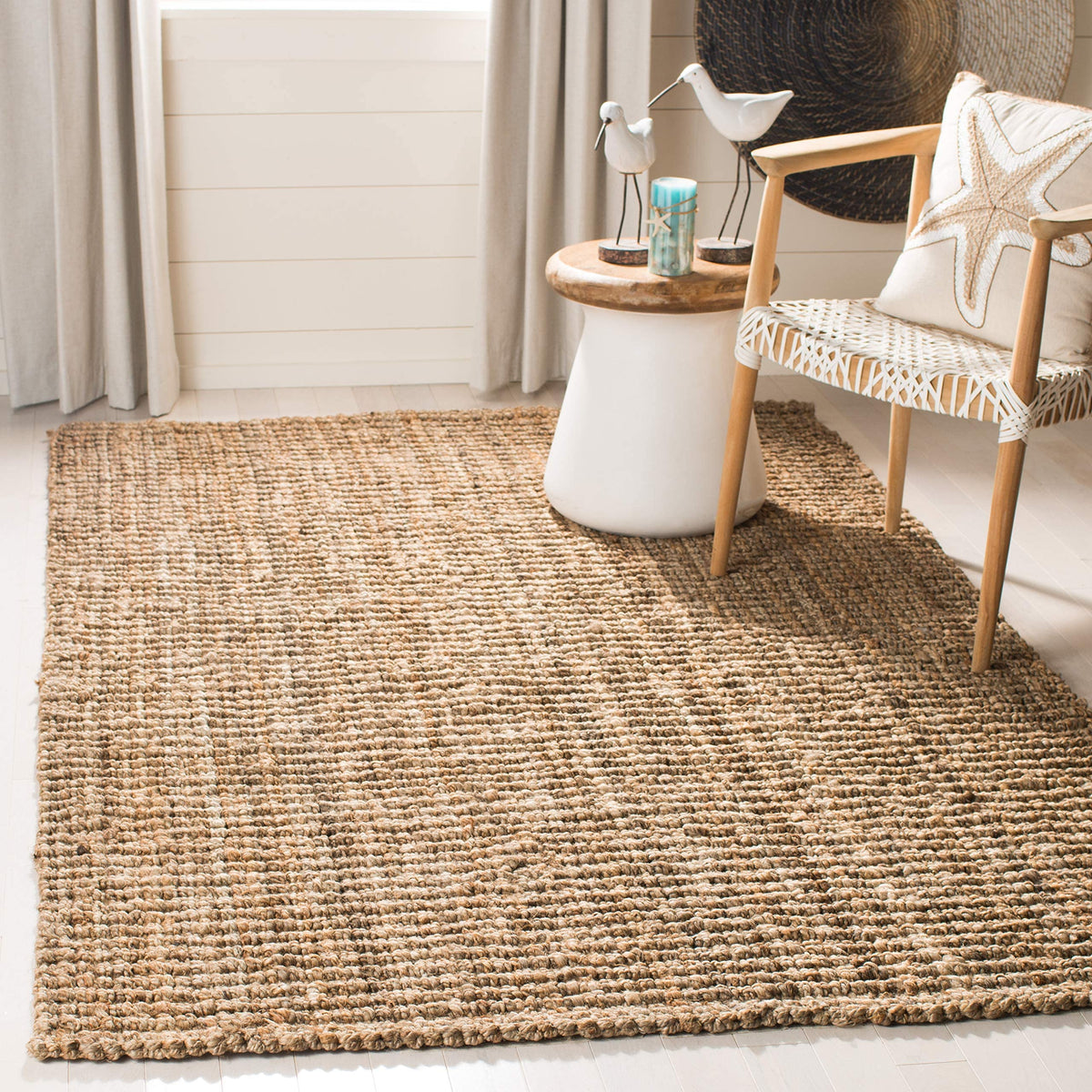 SAFAVIEH NF447A close-up of handmade jute weave highlights artisanal craftsmanship.